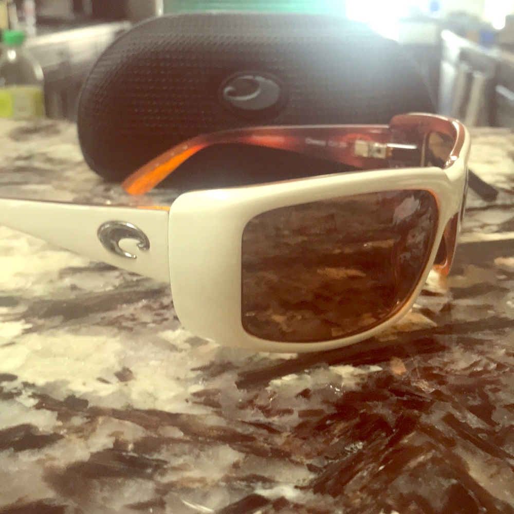 Costa white sunglasses